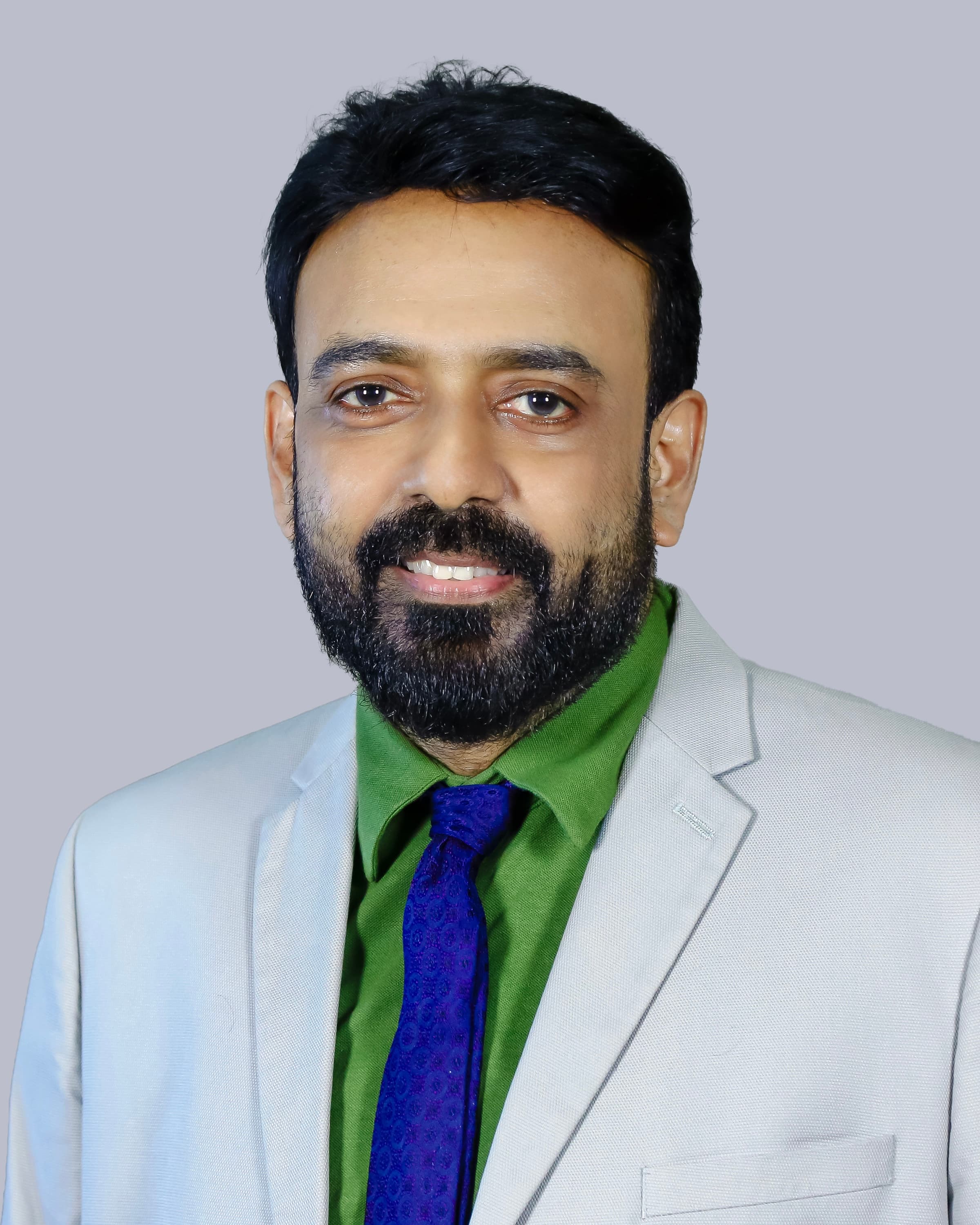 Dr. Anil N X